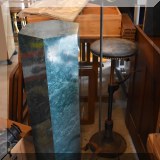 F132. Pedestal and candlestand.